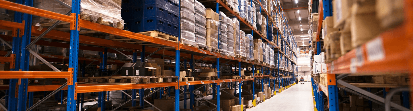 Warehouse interior with shelves and pallets